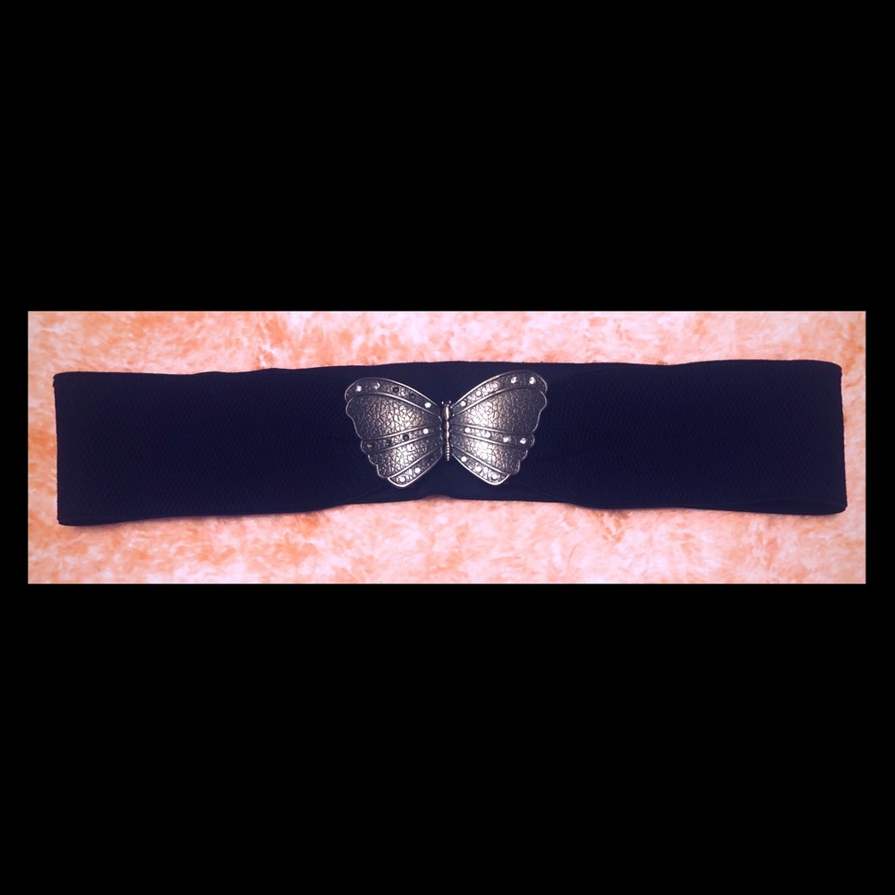 Black elastic belt with gold butterfly clasp.